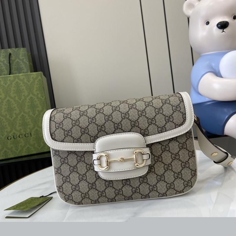 G*u*i satchel bags